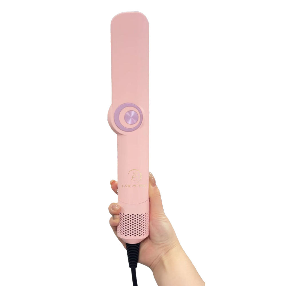 Pink handheld device held hair straighener by a hand on a white background